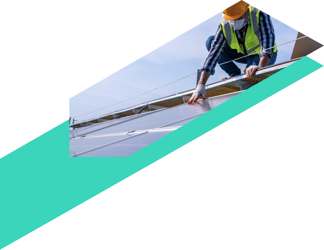 Person working on a solar panel