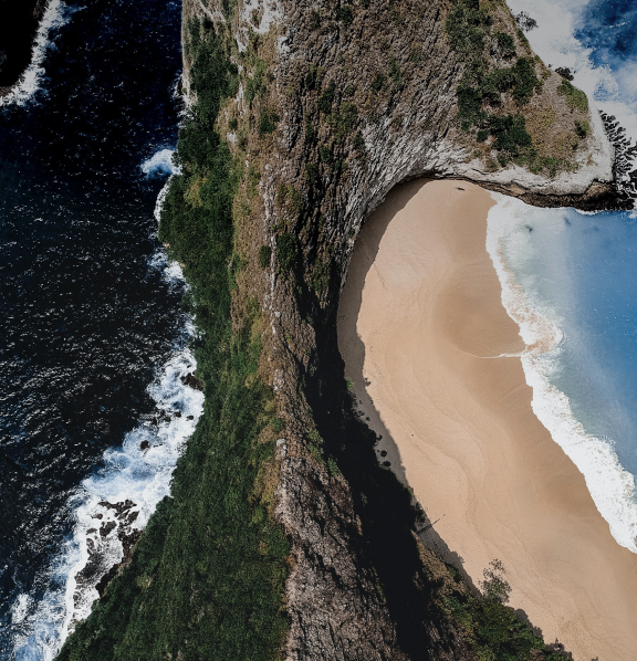 overhead shot with a mountain range separating two different bodies of water