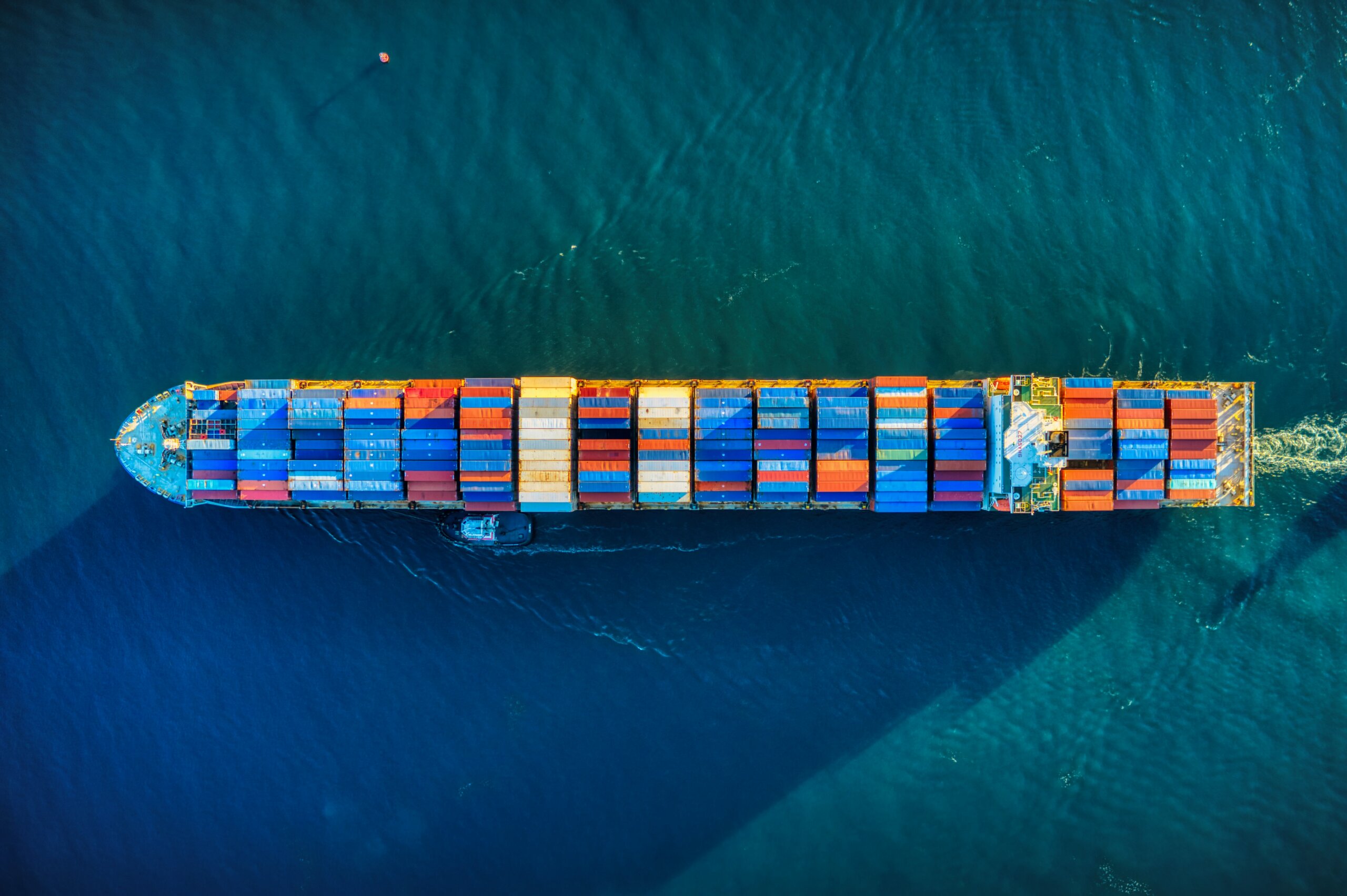 Overhead view of shipping containers on carrier vessel