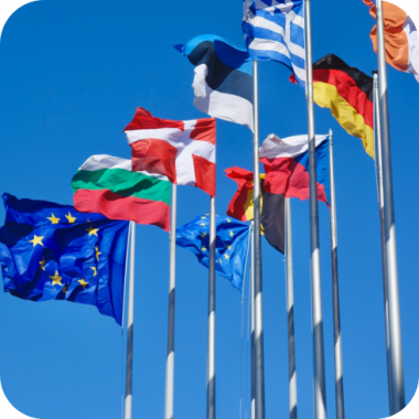 European Flags Wave Against a Blue Sky